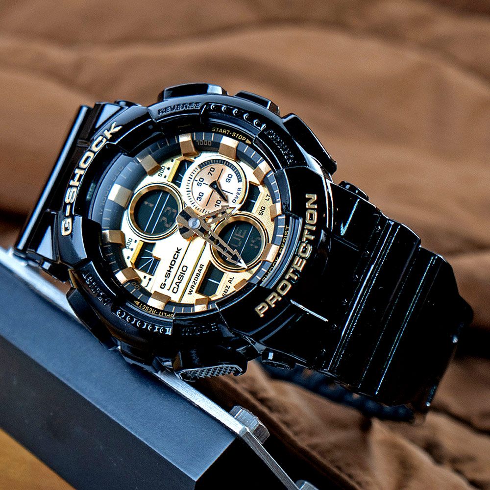 CASIO 卡西歐 G-SHOCK 耀眼機械風耐衝擊雙顯腕錶/黑x香檳金(GA-140GB-1A1)