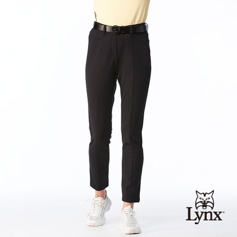 Lynx Golf 女款日本進口布料超潑水防汙修身設計脇邊剪裁造型窄管九分褲-黑色