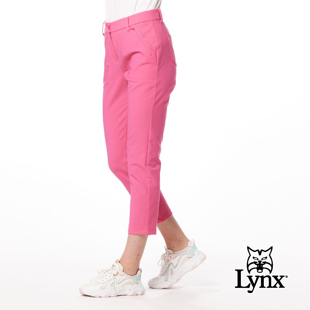 Lynx Golf 女款彈性舒適貼袋造型後腰LOGO針織帶剪接設計隱形拉鍊口袋窄管九分褲(二色)