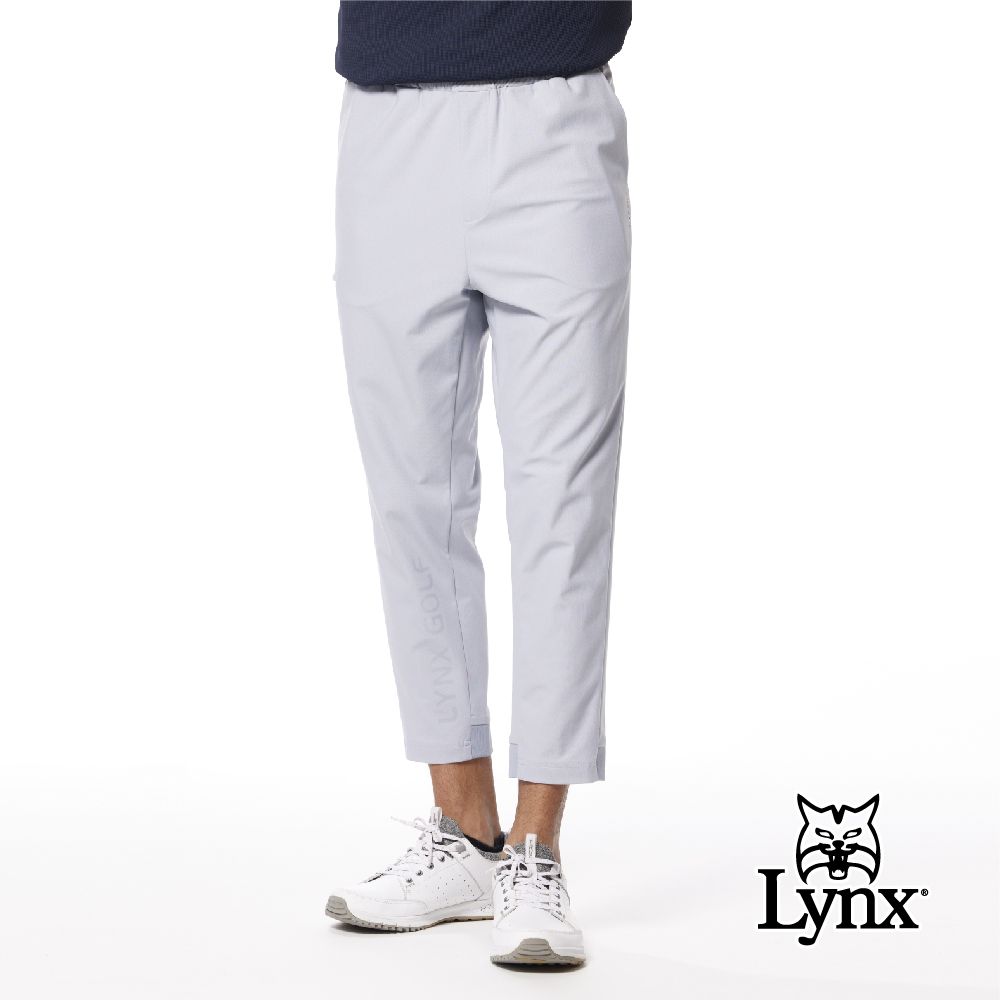 Lynx Golf 首爾高桿風格男款彈性舒適防潑水透明膠印造型羅紋褲口設計平口休閒長褲(二色)