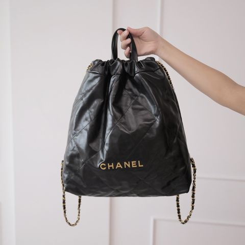 CHANEL 香奈兒 金屬大LOGO小牛皮束口金鍊後背包.黑